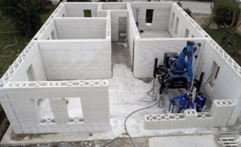 Resim 7. İSTON tarafından İstanbul’da 3 boyutlu yazıcı ile üretilen konut binası (URL-2).Image 7. Residential building produced with a 3D printer by ISTON in Istanbul (URL-2).