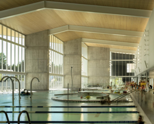 13-hcma_t╔Öm╔Ösew╠ôtx╩ÀACC_Social leisure pool with Mass Timber folded-plate roof_Credit Nic Lehoux