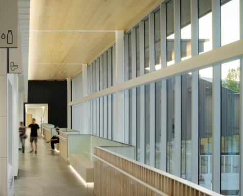 21-hcma_t╔Öm╔Ösew╠ôtx╩ÀACC_Level 2 circulation balcony with Mass Timber roof_Credit Nic Lehoux