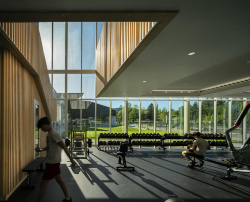 25-hcma_t╔Öm╔Ösew╠ôtx╩ÀACC_Fitness Centre with views to North Plaza_Credit Nic Lehoux